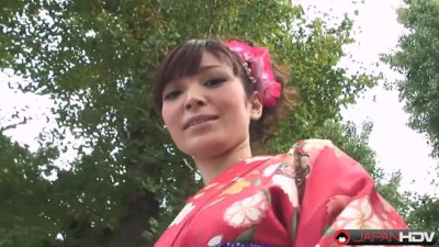 Kimono Lady Yuria Tominaga posing in sexy red dress