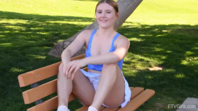 Adorable newcomer Zoey shows how bouncy her tits are in the park