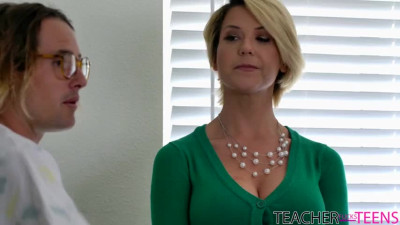 Short haired blonde teacher Kit Mercer seduces with her cleavage