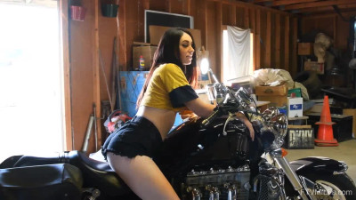 Slutty brunette Ashley Wolf fucks herself on a motorbike and in a car