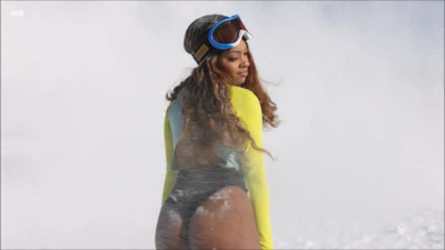 Sofi Vega poses in ski suit on snow