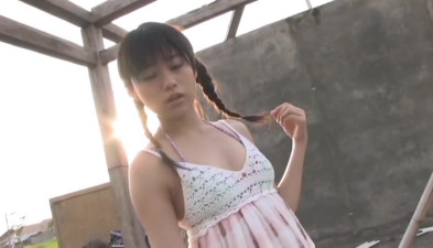 Pigtailed Japanese hottie Ami Tomite seductively sucks on a lollipop