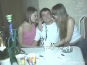 Two teen brunettes enjoy a sizzling threesome