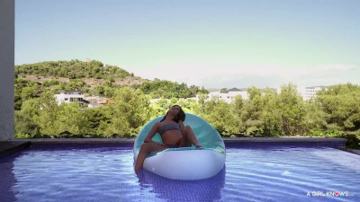 Anya Krey and Megane Lopez having fun by the pool