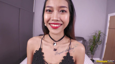 Thai babe sucks and fucks a white cock on a bed